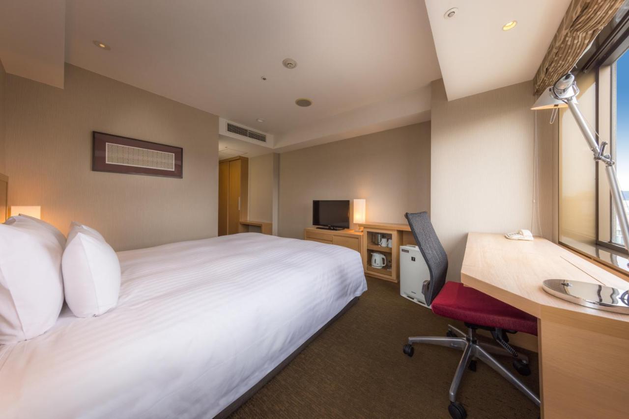 Hotel Associa Sizuoka Kültér fotó A room at Hotel Keihan